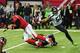 ATLANTA, GA - NOVEMBER 10: Matt Ryan #2 of the Atlanta Falcons is sacked by K. J. Wright #50 and Michael Bennett #72 of the Seattle Seahawks at the Georgia Dome on November 10, 2013 in Atlanta, Georgia. (Photo by Scott Cunningham/Getty Images)