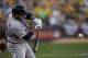 OAKLAND, CA - OCTOBER 10: Jhonny Peralta #27 of the Detroit Tigers bats in the second inning against the Oakland Athletics during Game Five of the American League Division Series at O.co Coliseum on October 10, 2013 in Oakland, California. (Photo by The