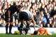 LIVERPOOL, ENGLAND - NOVEMBER 03: Hugo Lloris of Tottenham Hotspur lies injured during the Barclays Premier League match between Everton and Tottenham Hotspur at Goodison Park on November 03, 2013 in Liverpool, England. (Photo by Chris Brunskill/Getty Ima