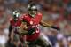 TAMPA, FL - NOVEMBER 11: Vincent Jackson #83 of the Tampa Bay Buccaneers carries the ball in the first quarter against the Miami Dolphins at Raymond James Stadium on November 11, 2013 in Tampa, Florida. (Photo by Mike Ehrmann/Getty Images)