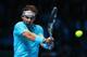LONDON, ENGLAND - NOVEMBER 11: Rafael Nadal of Spain hits a backhand in his men's singles final match against Novak Djokovic of Serbia during day eight of the Barclays ATP World Tour Finals at O2 Arena on November 11, 2013 in London, England. (Photo by