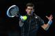 LONDON, ENGLAND - NOVEMBER 11: Novak Djokovic of Serbia hits a forehand in his men's singles final match against Rafael Nadal of Spain during day eight of the Barclays ATP World Tour Finals at O2 Arena on November 11, 2013 in London, England. (Photo by