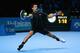 LONDON, ENGLAND - NOVEMBER 11: Novak Djokovic of Serbia hits a forehand in his men's singles final match against Rafael Nadal of Spain during day eight of the Barclays ATP World Tour Finals at O2 Arena on November 11, 2013 in London, England. (Photo by