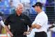 BALTIMORE, MD - AUGUST 15: Head coaches Mike Smith of the Atlanta Falcons (L) and John Harbaugh of the Baltimore Ravens talk prior to the start of a preseason game at M&T Bank Stadium on August 15, 2013 in Baltimore, Maryland. (Photo by Rob Carr/Getty Im