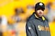 PITTSBURGH, PA - DECEMBER 23: Offensive Coordinator Todd Haley of the Pittsburgh Steelers watches his team warm up prior to the game against the Cincinnati Bengals during the game at Heinz Field on December 23, 2012 in Pittsburgh, Pennsylvania. (Photo b