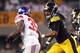 PITTSBURGH, PA - AUGUST 10: Jarvis Jones #95 of the Pittsburgh Steelers pursues Andre Brown #35 of the New York Giants during the game on August 10, 2013 at Heinz Field in Pittsburgh, Pennsylvania. (Photo by Justin K. Aller/Getty Images)