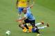 BELO HORIZONTE, BRAZIL - JUNE 26: Egidio Arevalo Rios of Uruguay competes with Neymar of Brazil during the FIFA Confederations Cup Brazil 2013 Semi Final match between Brazil and Uruguay at Governador Magalhaes Pinto Estadio Mineirao on June 26, 2013 in