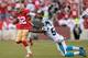 SAN FRANCISCO, CA - NOVEMBER 10: Mario Manningham #82 of the San Francisco 49ers pushes away from would be tackler Thomas Davis #58 of the Carolina Panthers during the fourth quarter at Candlestick Park on November 10, 2013 in San Francisco, California.