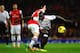 LONDON, ENGLAND - NOVEMBER 02: Mamadou Sakho of Liverpool battles for the ball with Tomas Rosicky of Arsenal during the Barclays Premier League match between Arsenal and Liverpool at Emirates Stadium on November 2, 2013 in London, England. (Photo by La