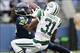 Nov 11, 2012; Seattle, WA, USA; Seattle Seahawks wide receiver Sidney Rice (18) and New York Jets cornerback Antonio Cromartie (31) both jump up for a pass during the 1st half at CenturyLink Field. Mandatory Credit: Steven Bisig-USA TODAY Sports