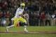 Nov 7, 2013; Stanford, CA, USA; Oregon Ducks quarterback Marcus Mariota (8) runs the ball against the Stanford Cardinal during the third quarter at Stanford Stadium. The Stanford Cardinal defeated the Oregon Ducks 26-20. Mandatory Credit: Kelley L Cox-USA