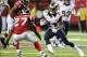Sep 15, 2013; Atlanta, GA, USA; St. Louis Rams running back Isaiah Pead (24) runs against Atlanta Falcons cornerback Robert McClain (27) during the second half at Georgia Dome. The Falcons defeated the Rams 31-24. Mandatory Credit: Dale Zanine-USA TODAY S