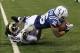 Nov 10, 2013; Indianapolis, IN, USA; Indianapolis Colts running back Dan Herron (36) is tackled by St. Louis Rams cornerback Cortland Finnegan (31) during the fourth quarter at Lucas Oil Stadium. The Rams won 38-8. Mandatory Credit: Pat Lovell-USA TODAY S