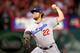ST LOUIS, MO - OCTOBER 18: Clayton Kershaw #22 of the Los Angeles Dodgers pitches in the first inning against the St. Louis Cardinals in Game Six of the National League Championship Series at Busch Stadium on October 18, 2013 in St Louis, Missouri. (Pho