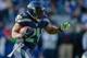 SEATTLE, WA - NOVEMBER 03: Running back Marshawn Lynch #24 of the Seattle Seahawks rushes against the Tampa Bay Buccaneers at CenturyLink Field on November 3, 2013 in Seattle, Washington. (Photo by Otto Greule Jr/Getty Images)