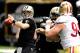 NEW ORLEANS, LA - NOVEMBER 25: Drew Brees #9 of the New Orleans Saints looks for a receiver during a game against the San Francisco 49ers at the Mercedes-Benz Superdome on November 25, 2012 in New Orleans, Louisiana. (Photo by Stacy Revere/Getty Images)