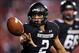 Oct 5, 2013; Evanston, IL, USA; Northwestern Wildcats quarterback Kain Colter (2) pitches the ball on an option play during the third quarter against the Ohio State Buckeyes at Ryan Field. Ohio State won 40-30. Mandatory Credit: Jerry Lai-USA TODAY Sports