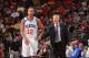 PHILADELPHIA, PA - NOVEMBER 8: Evan Turner #12 and Head Coach Brett Brown of the Philadelphia 76ers speak with eachother against the Cleveland Cavaliers at the Wells Fargo Center on November 8, 2013 in Philadelphia, Pennsylvania. NOTE TO USER: User expre
