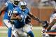 DETROIT, MI - SEPTEMBER 29: Calvin Johnson #81 of the Detroit Lions tries to break a tackle by Lance Briggs #55 of the Chicago Bears at Ford Field on September 29, 2013 in Detroit, Michigan. (Photo by Gregory Shamus/Getty Images)