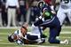 ST LOUIS, MO - OCTOBER 28: Russell Wilson #3 of the Seattle Seahawks gets sacked by William Hayes #95 the St. Louis Rams during an NFL game at Edward Jones Dome on October 28, 2013 in St Louis, Missouri. (Photo by Andy Lyons/Getty Images)