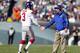 PHILADELPHIA, PA - OCTOBER 27: Kicker Josh Brown #3 of the New York Giants is congratulated by head coach Tom Coughlin after kicking a field goal during the first half against the Philadelphia Eagles. Brown kicked five field goals during the game at Linco