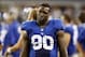 Sep 8, 2013; Arlington, TX, USA; New York Giants defensive end Jason Pierre-Paul (90) on the sidelines during the fourth quarter of the game against the Dallas Cowboys at AT&T Stadium. The Dallas Cowboys beat the New York Giants 36-31. Mandatory Credit: