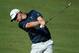 DUBAI, UNITED ARAB EMIRATES - NOVEMBER 12: Justin Rose of England plays his second shot on the ninth hole during the Pro Am prior to the start of the DP World Tour Championship, Dubai on the Earth Course at Jumeirah Golf Estates on November 12, 2013 in D