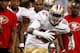 November 25, 2012; New Orleans, LA, USA; San Francisco 49ers wide receiver Mario Manningham (82) escapes from New Orleans Saints cornerback Jabari Greer (33) during the first half of a game at the Mercedes-Benz Superdome. Mandatory Credit: Derick E. Hingl