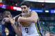 Nov 13, 2013; Salt Lake City, UT, USA; Utah Jazz center Enes Kanter (0) battles for a rebound with New Orleans Pelicans point guard Tyreke Evans (1) during the second half at EnergySolutions Arena. The Jazz won 111-105. Mandatory Credit: Russ Isabella-USA