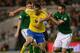 DUBLIN, IRELAND - SEPTEMBER 06: Zlatan Ibrahimovic of Republic of Ireland battles with Marc Wilson of Sweden during the FIFA 2014 World Cup Qualifying Group C match between Republic of Ireland and Sweden at Aviva Stadium on September 6, 2013 in Dublin, I