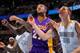 DENVER, CO - NOVEMBER 13: Jordan Hill #27 of the Los Angeles Lakers and Timofey Mozgov #25 of the Denver Nuggets battle for rebounding position at Pepsi Center on November 13, 2013 in Denver, Colorado. NOTE TO USER: User expressly acknowledges and agrees