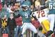 Dec 23, 2012; Philadelphia, PA, USA; Philadelphia Eagles quarterback Nick Foles (9) is pressured on the final play of the game by Washington Redskins defensive end Stephen Bowen (72) at Lincoln Financial Field. Th Redskins defeated the Eagles, 27-20. Man