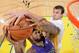 OAKLAND, CA - NOVEMBER 2: Andrew Bogut #12 of the Golden State Warriors blocks a shot against DeMarcus Cousins #15 of the Sacramento Kings on November 2, 2013 at Oracle Arena in Oakland, California. NOTE TO USER: User expressly acknowledges and agrees tha