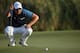 DUBAI, UNITED ARAB EMIRATES - NOVEMBER 14: Henrik Stenson of Sweden lines up a putt on the 17th hole during the first round of the DP World Tour Championship, Dubai on the Earth Course at Jumeirah Golf Estates on November 14, 2013 in Dubai, United Arab E