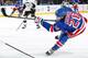 NEW YORK, NY - NOVEMBER 06: Chris Kreider #20 of the New York Rangers shoots the puck against the Pittsburgh Penguins at Madison Square Garden on November 6, 2013 in New York City. The New York Rangers won 5-1. (Photo by Scott Levy/NHLI via Getty Images)