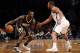 NEW YORK, NY - NOVEMBER 09: Lance Stephenson #1 of the Indiana Pacers drives against Alan Anderson #6 of the Brooklyn Nets during the second half at Barclays Center on November 9, 2013 in the Brooklyn borough of New York City. The Pacers defeat the Nets