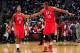 ATLANTA, GA - NOVEMBER 1: Al Horford #15 and Jeff Teague #0 of the Atlanta Hawks celebrate against the Toronto Raptors on November 1, 2013 at Philips Arena in Atlanta, Georgia. NOTE TO USER: User expressly acknowledges and agrees that, by downloading an