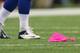 ARLINGTON, TX - OCTOBER 06: A pink penalty flag sits on the field during play between the Denver Broncos and the Dallas Cowboys at AT&T Stadium on October 6, 2013 in Arlington, Texas. (Photo by Ronald Martinez/Getty Images)