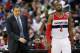 WASHINGTON, DC - APRIL 02: Head coach Randy Wittman of the Washington Wizards and John Wall #2 watch from the bench during the first half against the Chicago Bulls at Verizon Center on April 2, 2013 in Washington, DC. NOTE TO USER: User expressly acknowle