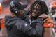 CINCINNATI, OH - OCTOBER 27: Head Coach Marvin Lewis and Vontaze Burfict #55 of the Cincinnati Bengals celebrate a play during their game against the New York Jets at Paul Brown Stadium on October 27, 2013 in Cincinnati, Ohio. The Bengals defeated the J
