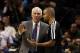 Nov 13, 2013; San Antonio, TX, USA; San Antonio Spurs head coach Gregg Popovich talks with guard Tony Parker (right) during the second half at AT&T Center. The Spurs won 92-79. Mandatory Credit: Soobum Im-USA TODAY Sports