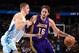 DENVER, CO - NOVEMBER 13: Pau Gasol #16 of the Los Angeles Lakers drives to the basket against the Denver Nuggets on November 13, 2013 at the Pepsi Center in Denver, Colorado. NOTE TO USER: User expressly acknowledges and agrees that, by downloading and/