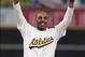 Oct 10, 2012; Oakland, CA, USA; Professional boxer Andre Ward reacts before throwing out the ceremonial first pitch before game four of the 2012 ALDS between the Oakland Athletics and Detroit Tigers at O.co Coliseum. Mandatory Credit: Kelley L Cox-USA TOD