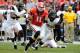 Nov 9, 2013; Athens, GA, USA; Georgia Bulldogs quarterback Aaron Murray (11) runs through the Appalachian State Mountaineers defense during the second half at Sanford Stadium. Georgia defeated Appalachian State 45-6. Mandatory Credit: Dale Zanine-USA TODA