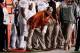 Nov 9, 2013; Morgantown, WV, USA; Texas Longhorns head coach Mack Brown (center) looks on during the game against the West Virginia Mountaineers at Milan Puskar Stadium. Mandatory Credit: Evan Habeeb-USA TODAY Sports