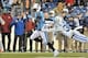 Nov 14, 2013; Nashville, TN, USA; Tennessee Titans running back Chris Johnson (28) breaks the tackle attempt by Indianapolis Colts strong safety LaRon Landry (30) and rushes for a touchdown during the first half at LP Field. Mandatory Credit: Jim Brown-US