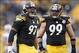 Nov 10, 2013; Pittsburgh, PA, USA; Pittsburgh Steelers defensive end Cameron Heyward (97) and defensive end Brett Keisel (99) react after Heyward registered a sack against the Buffalo Bills during the fourth quarter at Heinz Field. The Pittsburgh Steelers