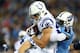 NASHVILLE, TN - NOVEMBER 14: Coby Fleener #80 of the Indianapolis Colts tries to break the tackle of Jason McCourty #30 of the Tennessee Titans in the first quarter at LP Field on November 14, 2013 in Nashville, Tennessee. (Photo by Andy Lyons/Getty Im
