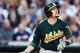DETROIT, MI - OCTOBER 08: Jed Lowrie #8 of the Oakland Athletics hits a two run home run in the fifth inning against the Detroit Tigers during Game Four of the American League Division Series at Comerica Park on October 8, 2013 in Detroit, Michigan. (Ph