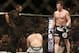 Aug 17, 2013; Boston, MA, USA; Chael Sonnen (right) celebrates his win over Shogun Rua (left) during a UFC light heavyweight match at the TD Garden. Sonnen won in one round by a knockout. Mandatory Credit: Winslow Townson-USA TODAY Sports